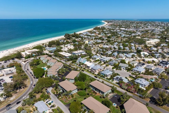 aerial view with a beach view and a water view