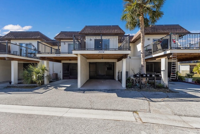 view of front of property featuring cooling unit