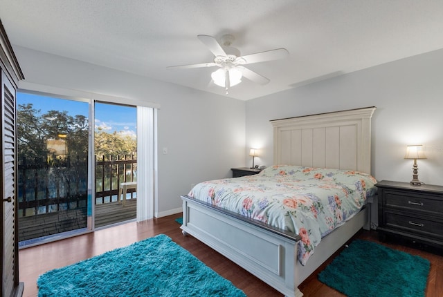 bedroom featuring access to outside, ceiling fan, and dark hardwood / wood-style flooring