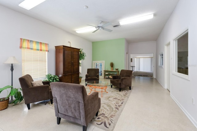 living room with ceiling fan