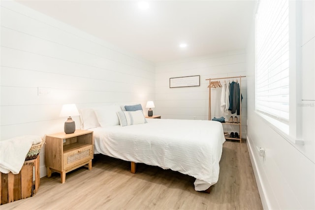 bedroom featuring hardwood / wood-style floors