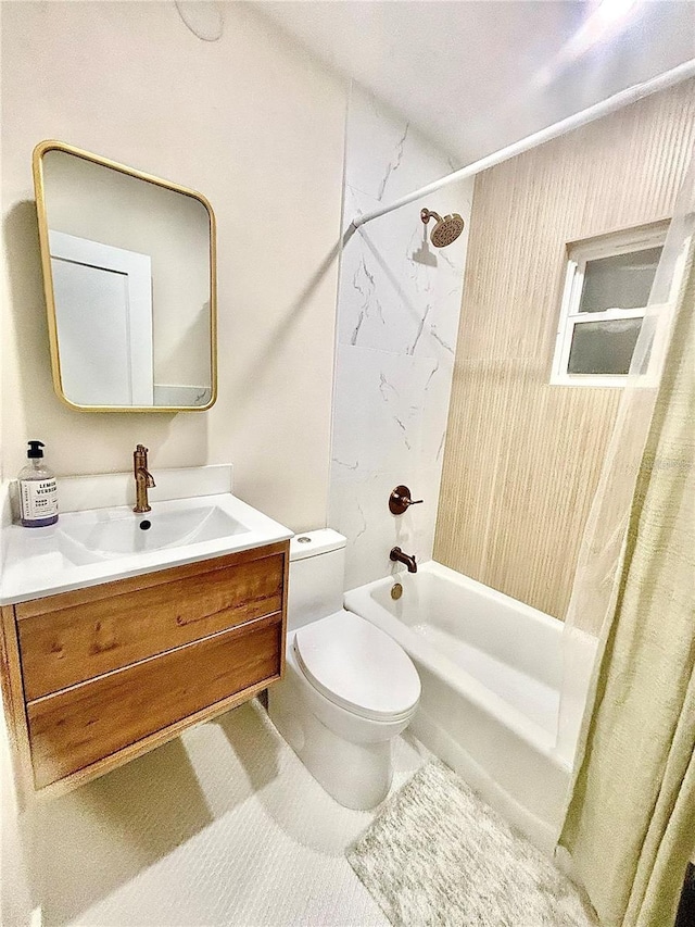 full bathroom featuring tile patterned floors, vanity, toilet, and shower / bath combo with shower curtain