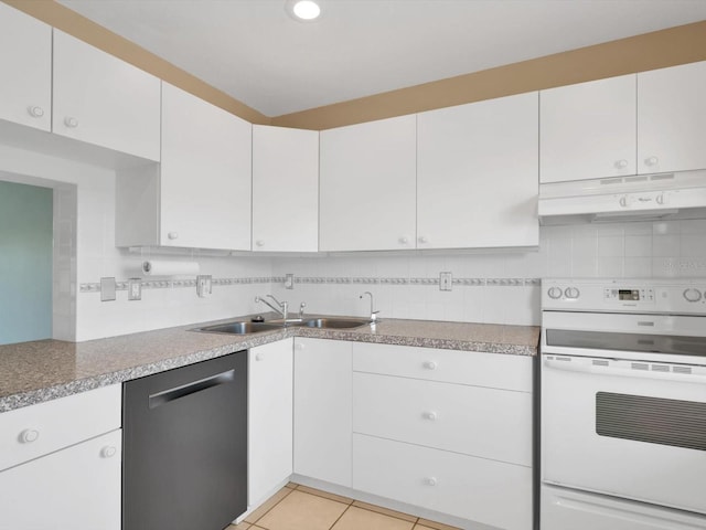 kitchen featuring dishwasher, white range oven, white cabinetry, and sink