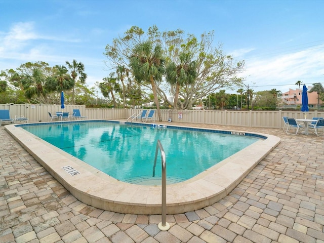 view of pool featuring a patio