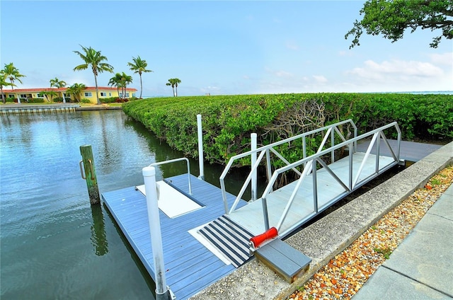 view of dock with a water view