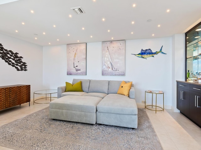 living room featuring light tile patterned flooring