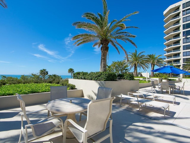 view of patio / terrace with a water view