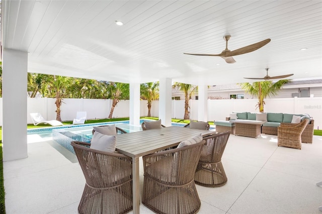 view of patio featuring a fenced in pool and an outdoor hangout area