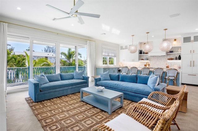 living room featuring ceiling fan