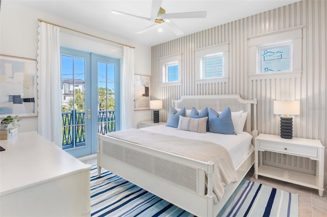 bedroom featuring ceiling fan, access to outside, and french doors