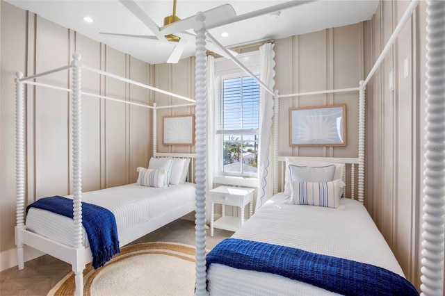 bedroom featuring ceiling fan and parquet flooring