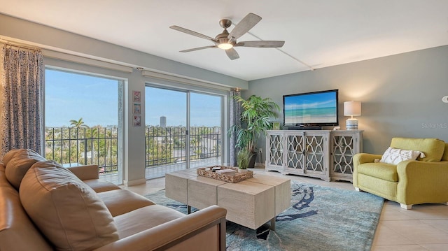 tiled living room featuring ceiling fan