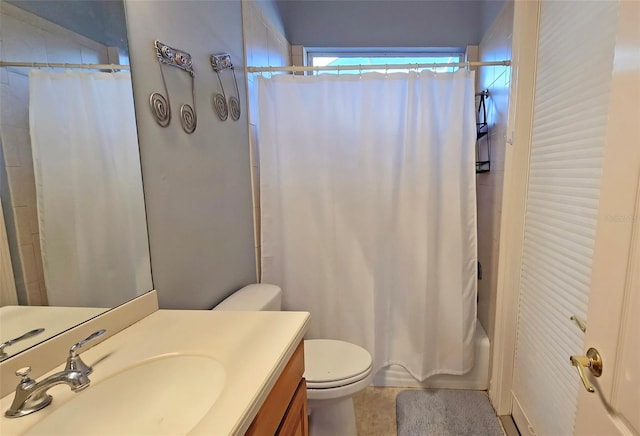 full bathroom with tile patterned flooring, vanity, toilet, and shower / bath combo