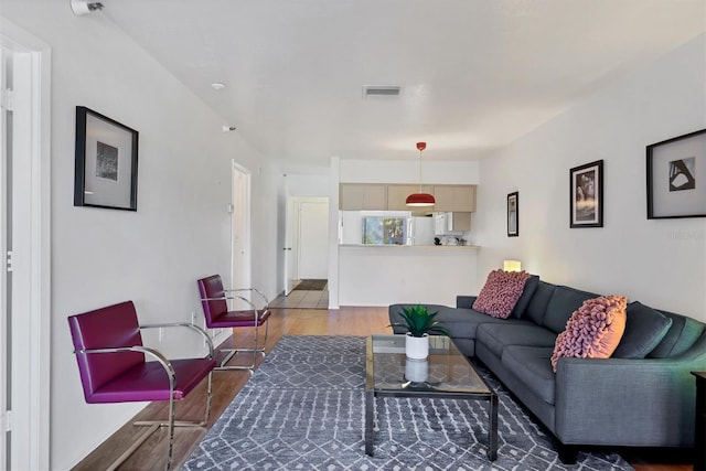 living room with light hardwood / wood-style floors