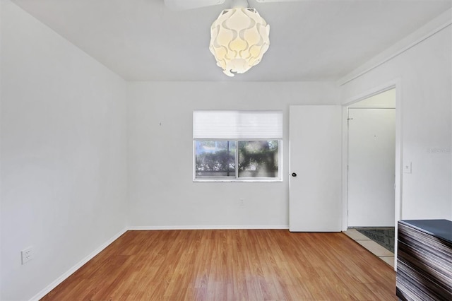 spare room with light wood-type flooring