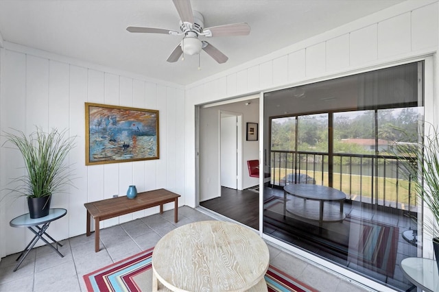 2124 N Tamiami Trl Unit 103, Sarasota, FL 34234 - sitting room featuring tile patterned floors and a ceiling fan