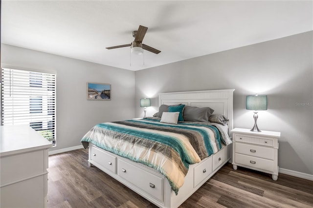 bedroom featuring ceiling fan and dark wood-type flooring