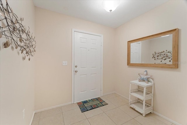 entrance foyer featuring light tile patterned floors