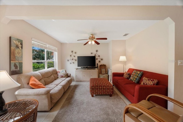 living room featuring ceiling fan and light tile patterned flooring