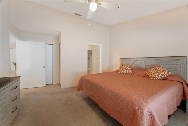 bedroom with light colored carpet and ceiling fan