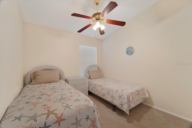 bedroom featuring carpet flooring, ceiling fan, and lofted ceiling