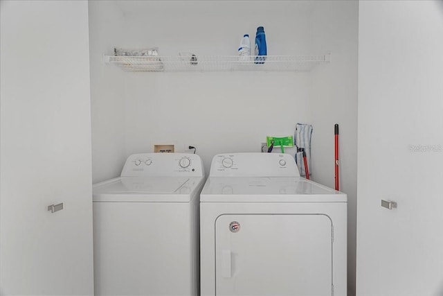 laundry room featuring washer and dryer