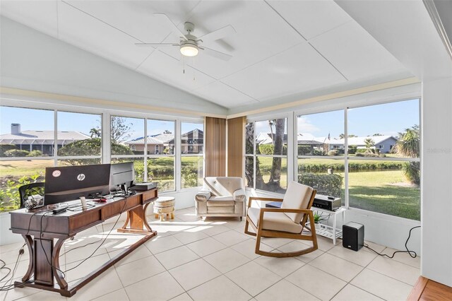 sunroom with a wealth of natural light, ceiling fan, and lofted ceiling