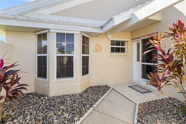 doorway to property featuring a patio