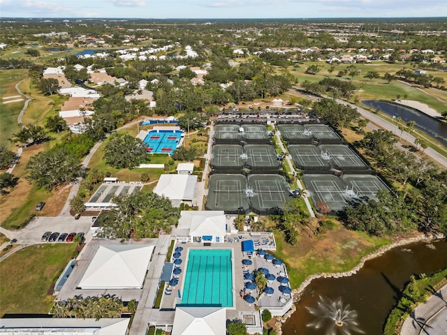 bird's eye view with a water view