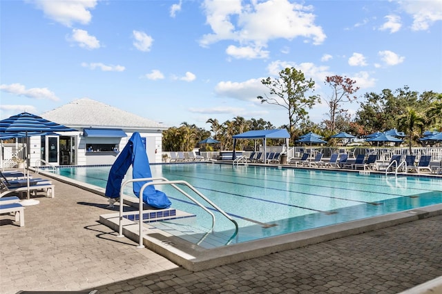 view of pool featuring a patio