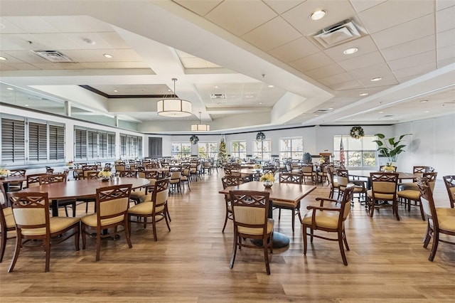 dining room with hardwood / wood-style flooring