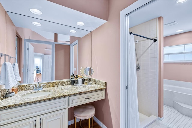 bathroom featuring tile patterned floors, vanity, and curtained shower