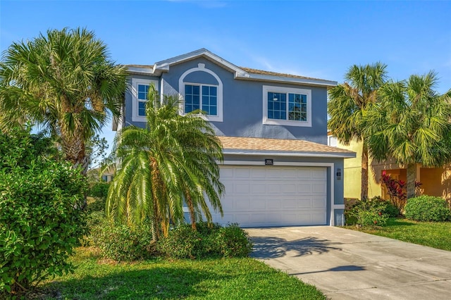 view of front of property featuring a garage