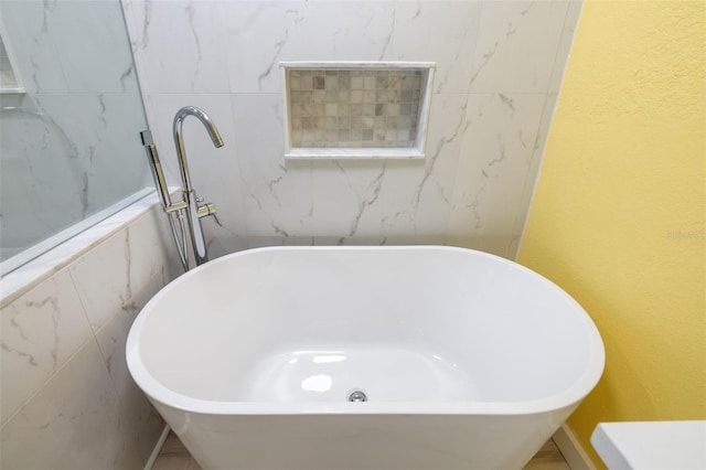 bathroom featuring a bathing tub