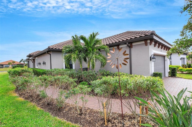 view of home's exterior with a garage