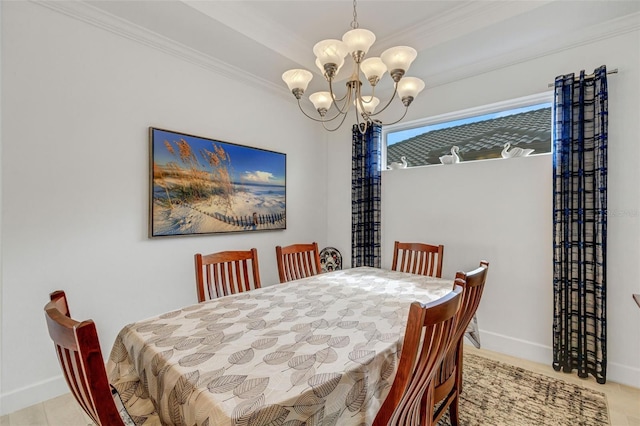 dining area featuring crown molding and an inviting chandelier