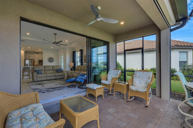 view of patio / terrace featuring an outdoor living space and ceiling fan