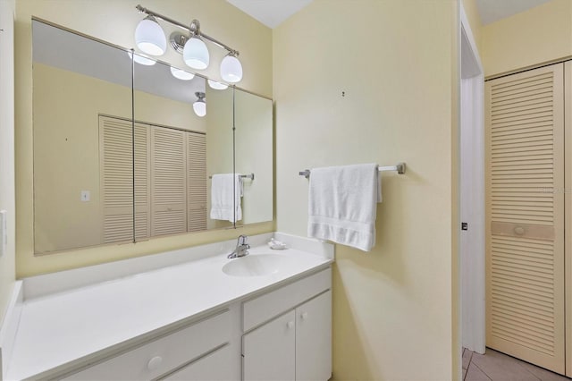 bathroom with vanity and tile patterned floors