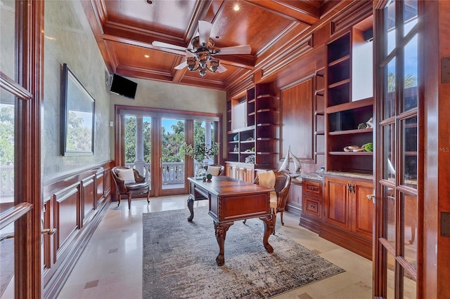 office area featuring built in features, french doors, coffered ceiling, and ornamental molding