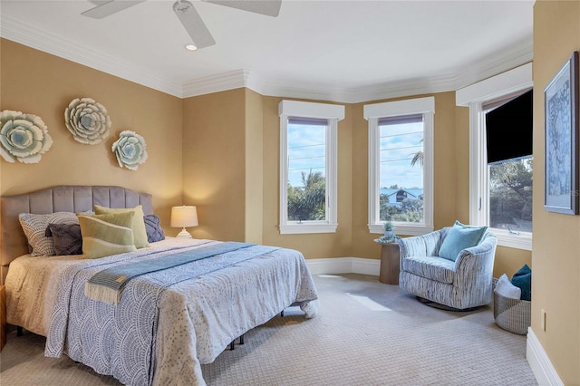 bedroom featuring carpet flooring, ceiling fan, and ornamental molding