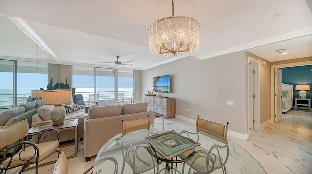 living room with expansive windows, a water view, ceiling fan with notable chandelier, and ornamental molding