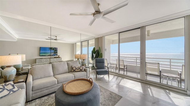 living room featuring ceiling fan, expansive windows, and crown molding