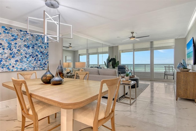 2105 Gulf Of Mexico Dr Unit 3303, Longboat Key, FL 34228 - dining area with ceiling fan, ornamental molding, and light marble finish floors