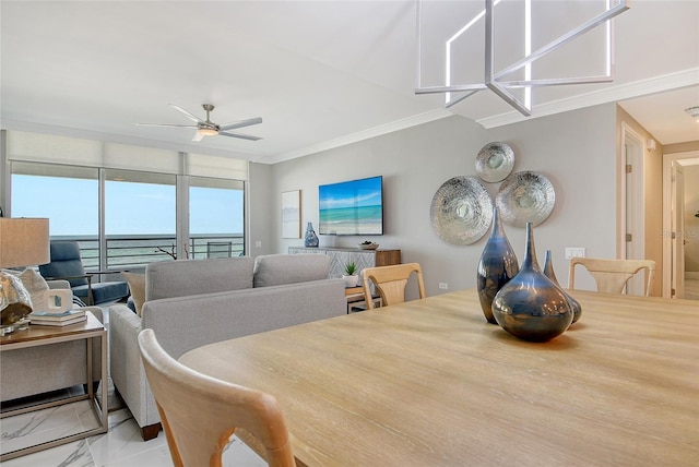 2105 Gulf Of Mexico Dr Unit 3303, Longboat Key, FL 34228 - dining room with crown molding and ceiling fan