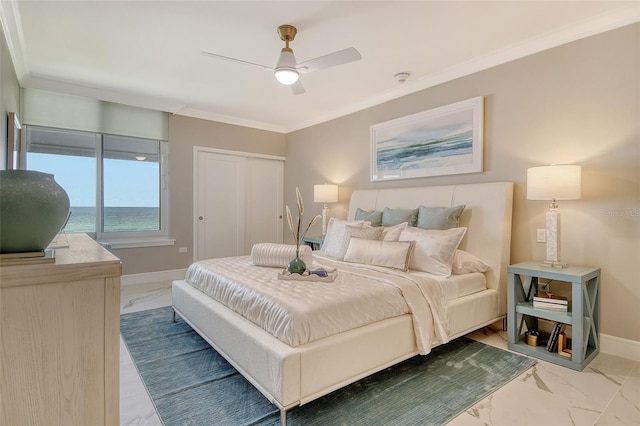 2105 Gulf Of Mexico Dr Unit 3303, Longboat Key, FL 34228 - bedroom featuring marble look tile flooring, crown molding, a closet, and a ceiling fan
