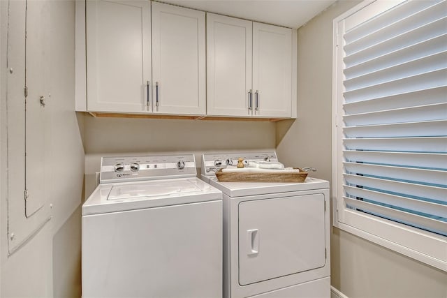 2105 Gulf Of Mexico Dr Unit 3303, Longboat Key, FL 34228 - washroom with independent washer and dryer and cabinet space