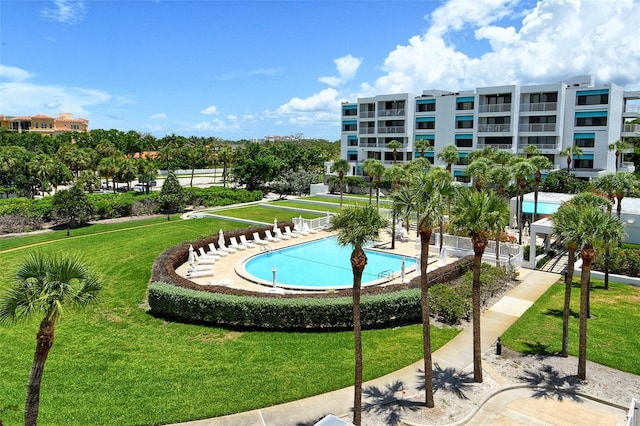 2105 Gulf Of Mexico Dr Unit 3303, Longboat Key, FL 34228 - view of swimming pool with a lawn