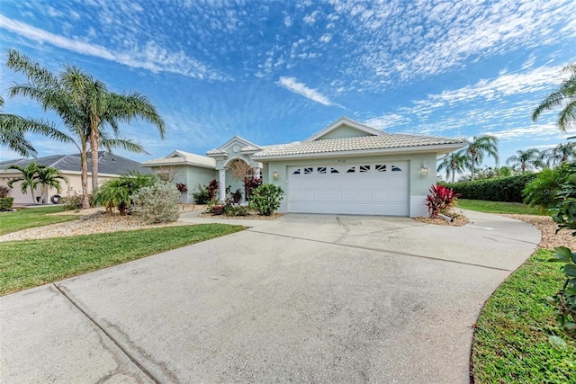 single story home featuring a garage