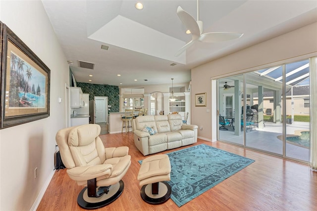 living room with light hardwood / wood-style flooring