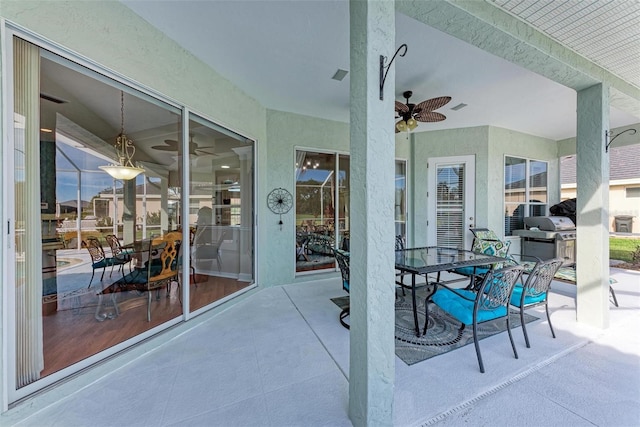 view of patio / terrace featuring grilling area and ceiling fan